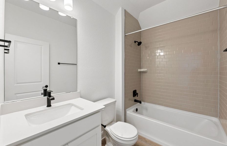 Furnished interior view inside a new home in Bluffview Reserve, Leander (Image 13).