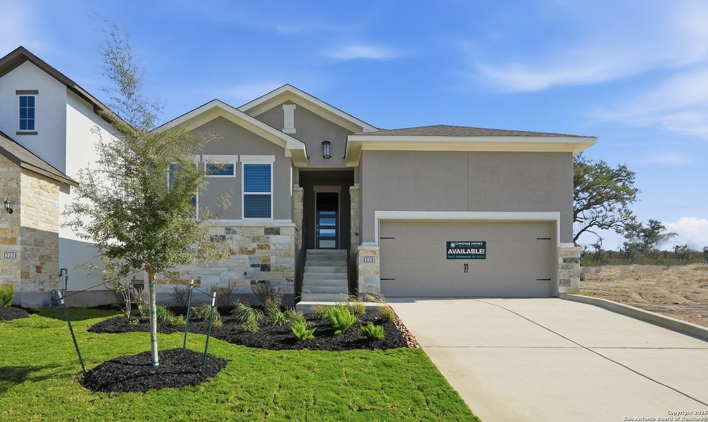 Front exterior of a new home in Esperanza – New Phase Now Selling, Boerne, TX, highlighting curb appeal (Image 2).