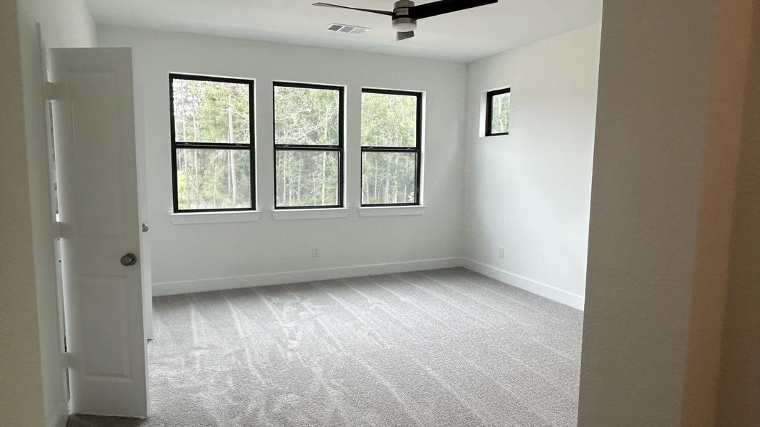 Spacious, unfurnished interior of a new home in Two Step Farm - Symphony Collection, Montgomery (Image 5).