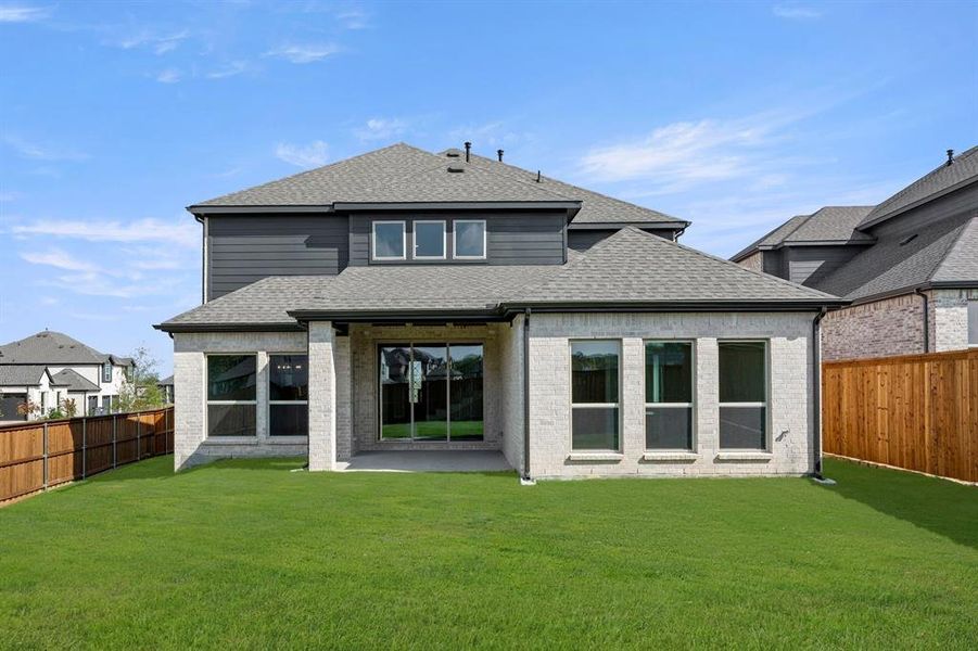 Exterior details and patio area of a home in Inspiration, Lucas (Image 4).