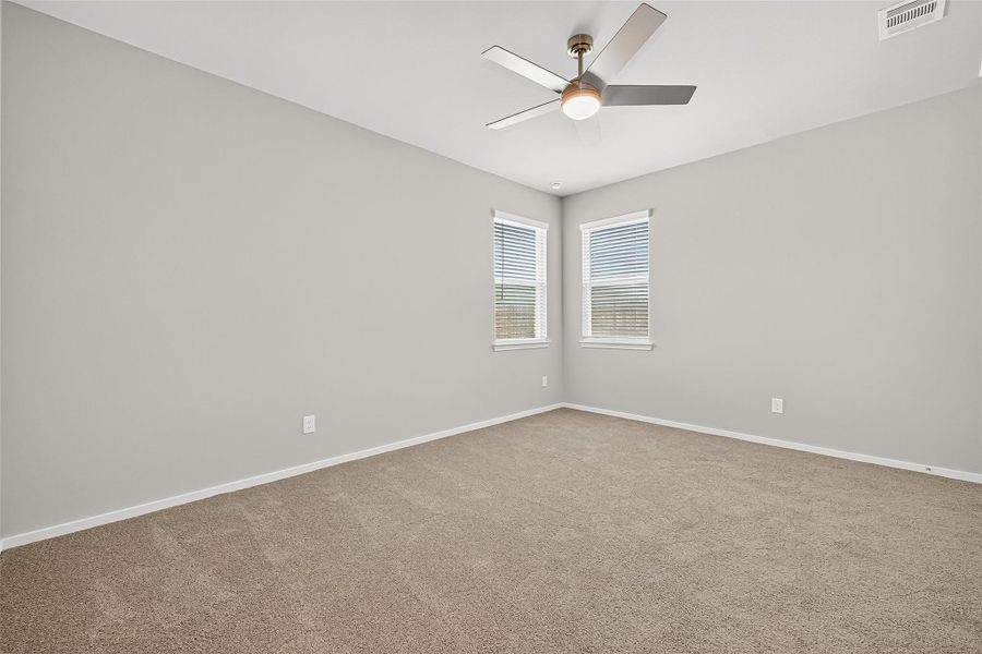 Spacious, unfurnished interior of a new home in Sunterra, Katy (Image 22).