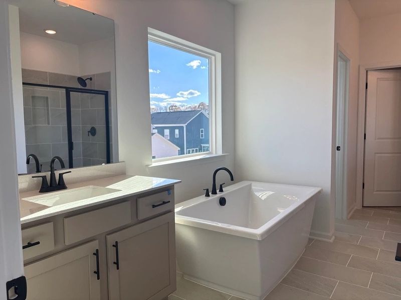 Primary Bath featuring the AW Collection® Foundry - Sleek finishes and dramatic contrasts shine.