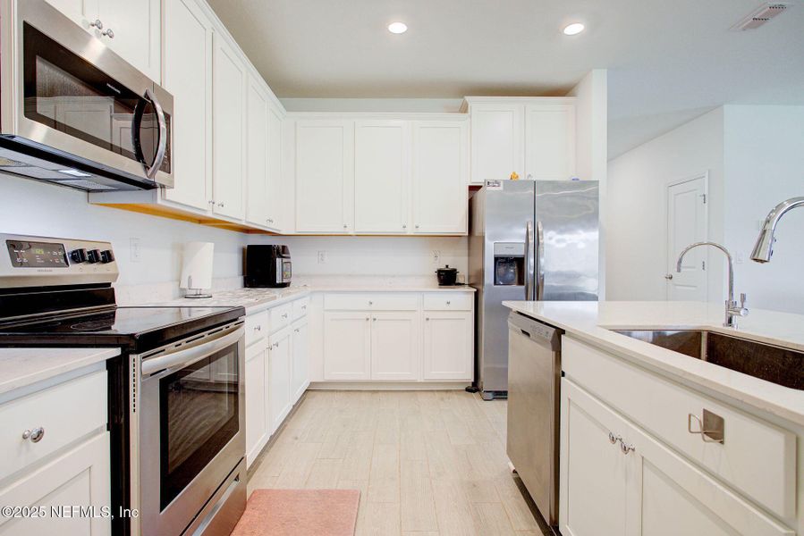 Furnished interior view inside a new home in , Green Cove Springs (Image 25).