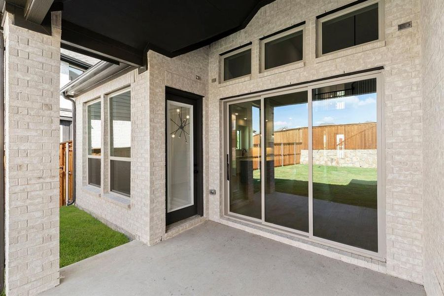 Exterior details and patio area of a home in Wellspring Estates, McKinney (Image 3). Exterior details and patio area of a home in Wellspring Estates, McKinney (Image 3).