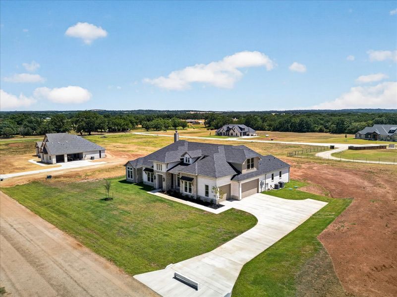 Front exterior of a new home in Brock Heights, Brock, TX, highlighting curb appeal (Image 33).