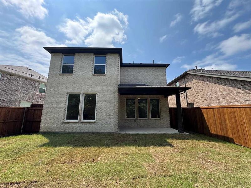 Front exterior of a new home in Devonshire 40s, Forney, TX, highlighting curb appeal (Image 2). Front exterior of a new home in Devonshire 40s, Forney, TX, highlighting curb appeal (Image 2).