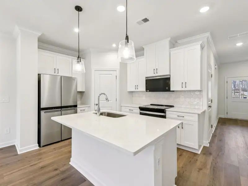 Furnished interior view inside a new home in Rocky River Towns, Charlotte (Image 4).