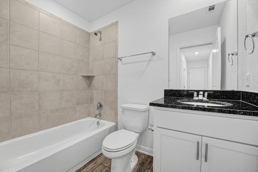 Furnished interior view inside a new home in Sunfield, Buda (Image 30).