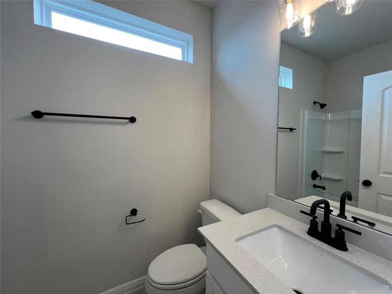 Furnished interior view inside a new home in Rolling Glen, Hutto (Image 13).