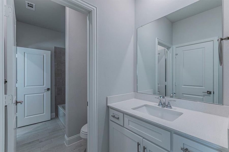 Bathroom with vanity and toilet Bathroom with vanity and toilet