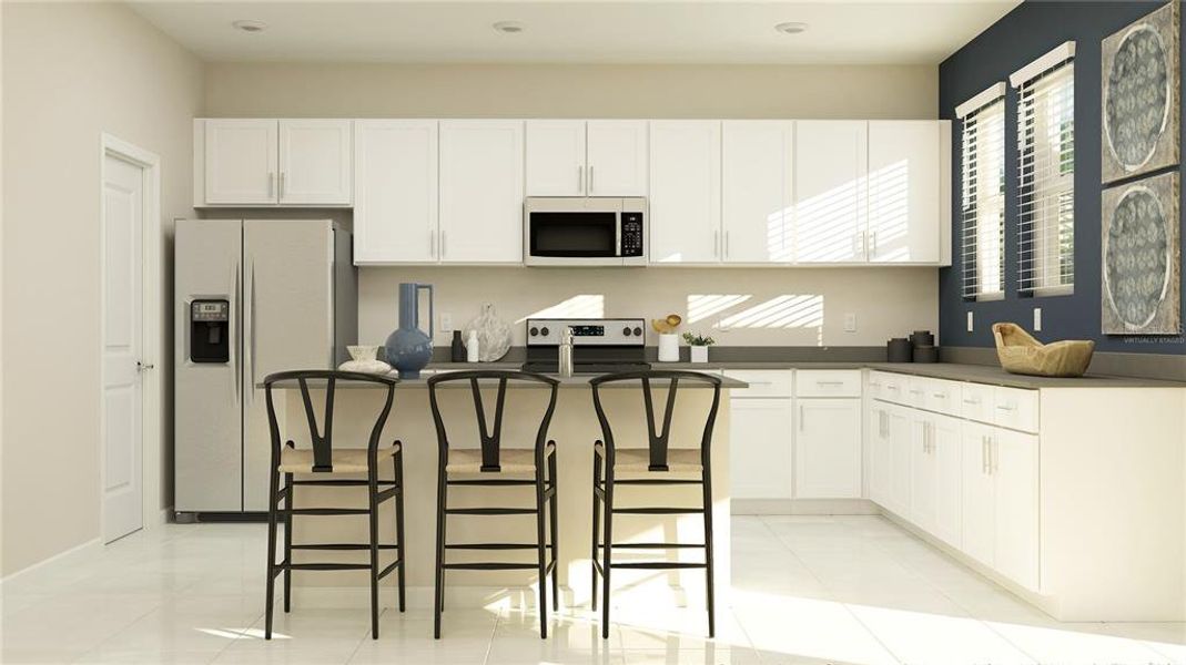 Furnished interior view inside a new home in Waterstone: Estate II Collection, Groveland (Image 15). Furnished interior view inside a new home in Waterstone: Estate II Collection, Groveland (Image 15).