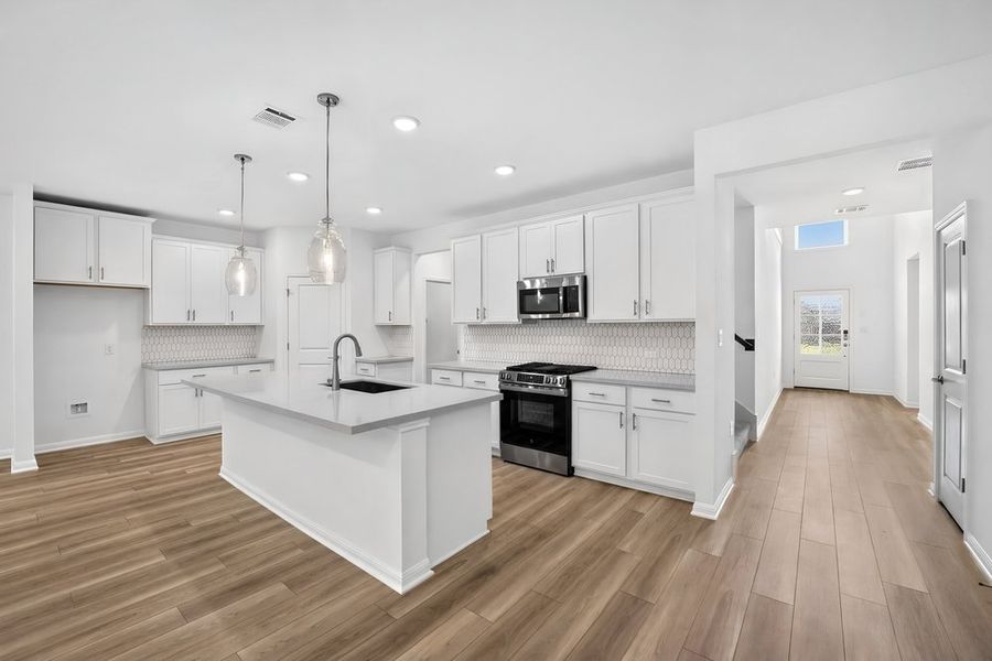 Furnished interior view inside a new home in Lisso, Pflugerville (Image 5).