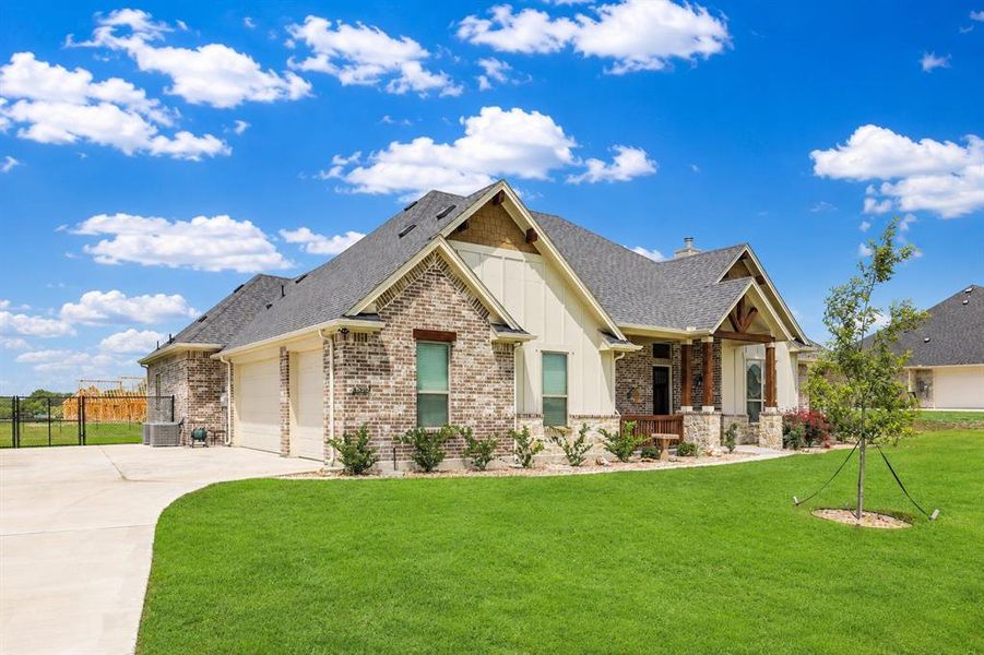 Front exterior of a new home in , Waxahachie, TX, highlighting curb appeal (Image 22).