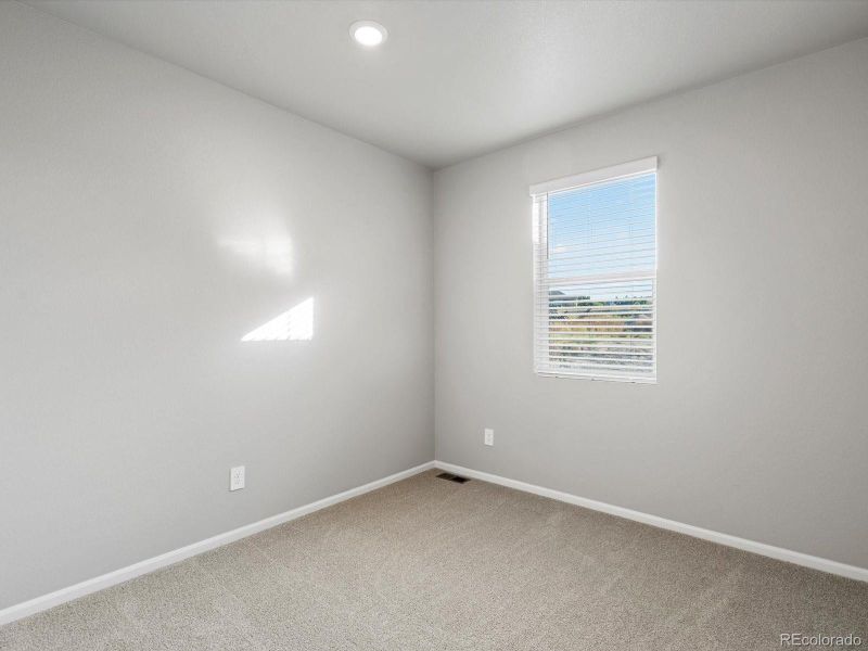 Spacious, unfurnished interior of a new home in Poudre Heights: The Lakes Collection, Windsor (Image 12).