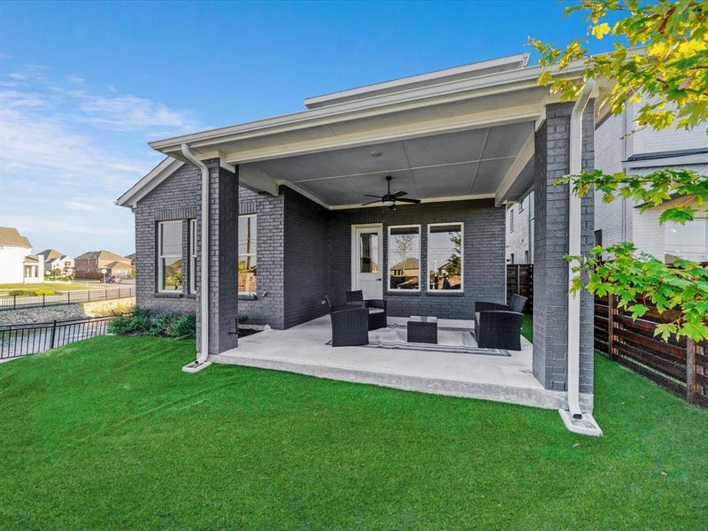 Exterior details and patio area of a home in Royal Court, Little Elm (Image 22).