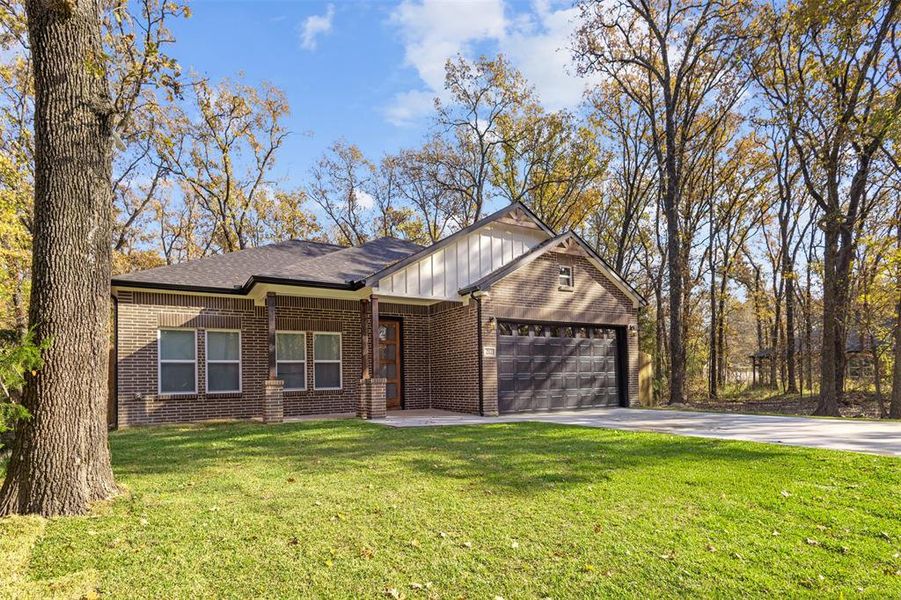 Front exterior of a new home in , Trinidad, TX, highlighting curb appeal (Image 2). Front exterior of a new home in , Trinidad, TX, highlighting curb appeal (Image 2).