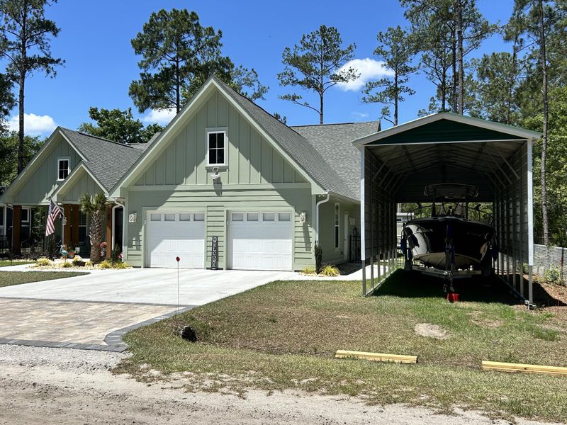 Front exterior of a new home in , Walterboro, SC, highlighting curb appeal (Image 25).