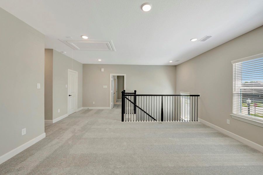 Spacious, unfurnished interior of a new home in Riceland - Summit Collection, Mont Belvieu (Image 28).