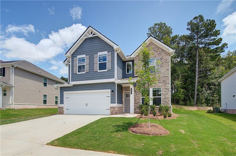 Front exterior of a new home in Westminster, Covington, GA, highlighting curb appeal (Image 13).