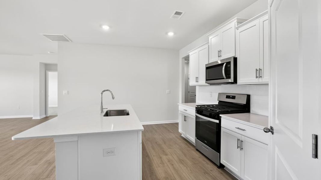 Furnished interior view inside a new home in Benjamin's Grove, Woodruff (Image 10).