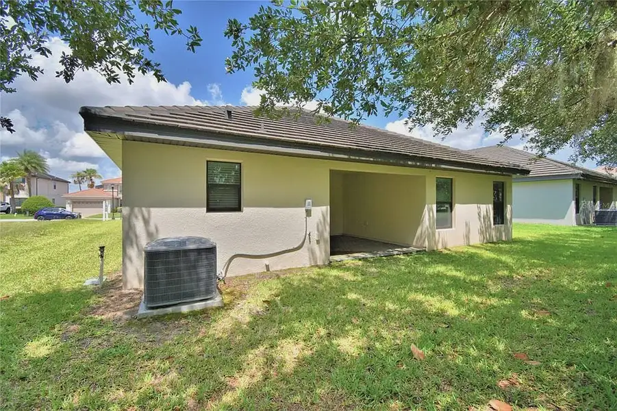 Exterior details and patio area of a home in Lake Juliana Estates, Auburndale (Image 4).