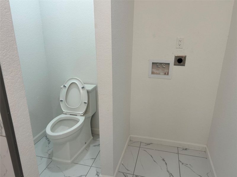 2nd floor bathroom/ laundry area