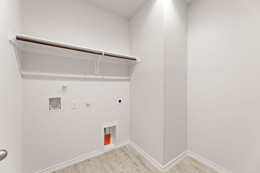 Representative exterior photo of a completed home built from the Hickory by Impression Homes in Creekside Ranch, Blue Ridge, TX (Image 22).