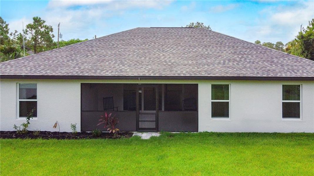Front exterior of a new home in , North Port, FL, highlighting curb appeal (Image 19). Front exterior of a new home in , North Port, FL, highlighting curb appeal (Image 19).