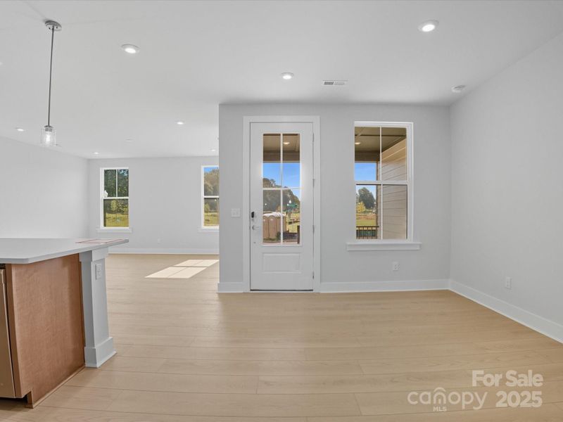 From the front entry you'll be greeted by the dining space.