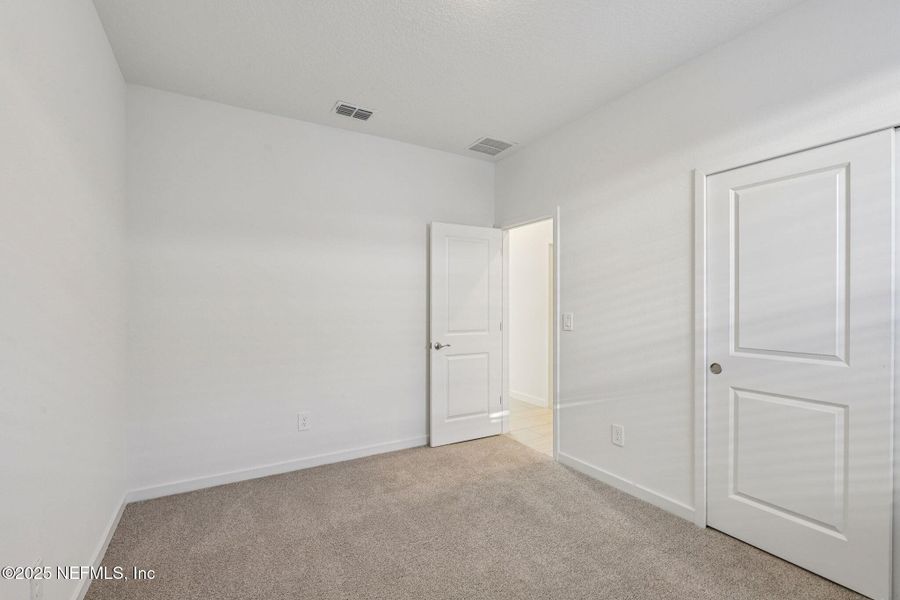 Spacious, unfurnished interior of a new home in Cypress Meadows - Signature Series, Jacksonville (Image 20).