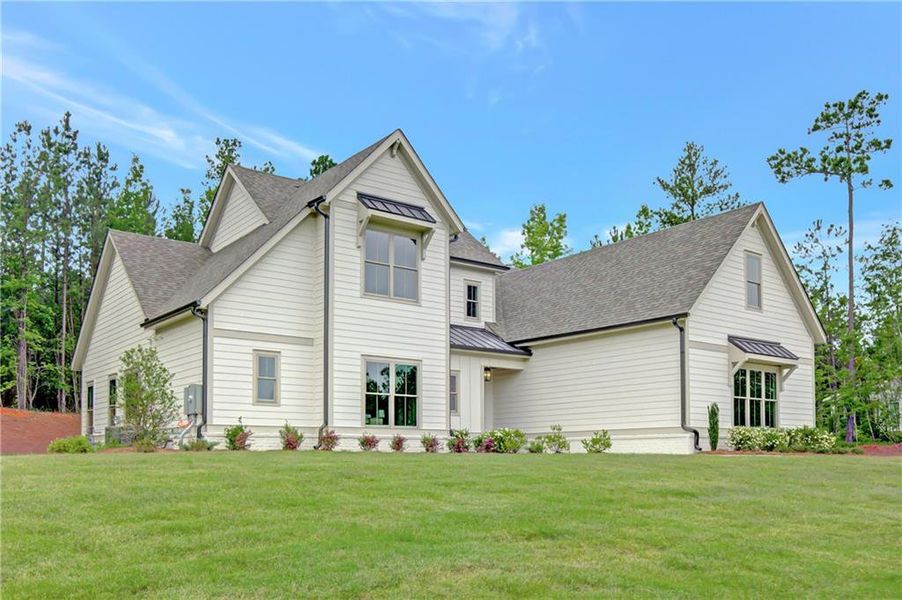 Front exterior of a new home in , Newnan, GA, highlighting curb appeal (Image 25). Front exterior of a new home in , Newnan, GA, highlighting curb appeal (Image 25).