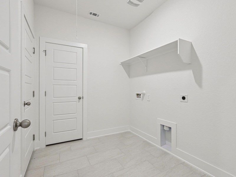 Photo is not of the actual home, but is an inspirational photo of builder’s model home and may depict options, furnishings, and/or decorator features that are not included