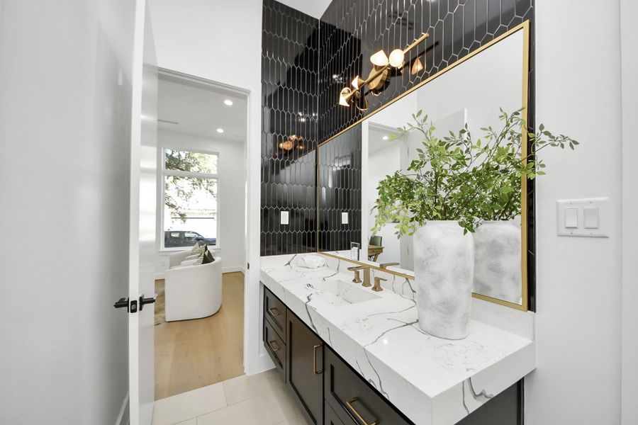 Bathroom 1/Powder Bath. Entrance from bedroom or hallway.