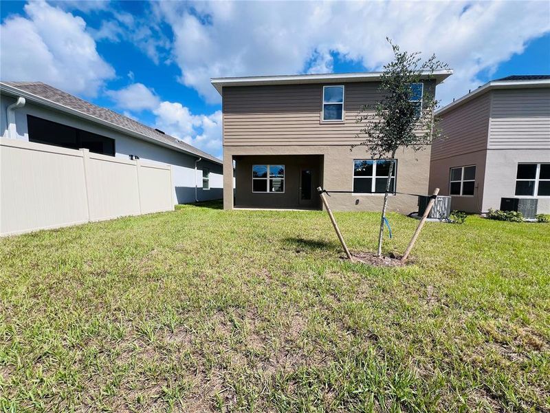 Exterior details and patio area of a home in Harmony Central, St. Cloud (Image 10).
