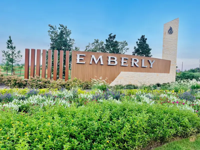 Entrance to the Emberly: Classic Collection community in Beasley, TX, featuring signage and landscaping (Image 10).