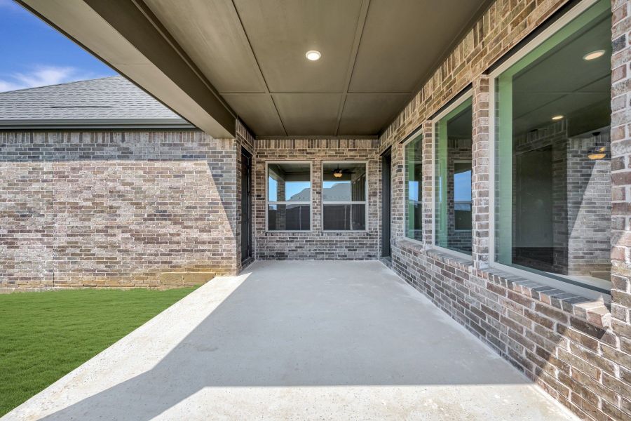 Exterior details and patio area of a home in Elements at Viridian - Signature Series, Arlington (Image 3).
