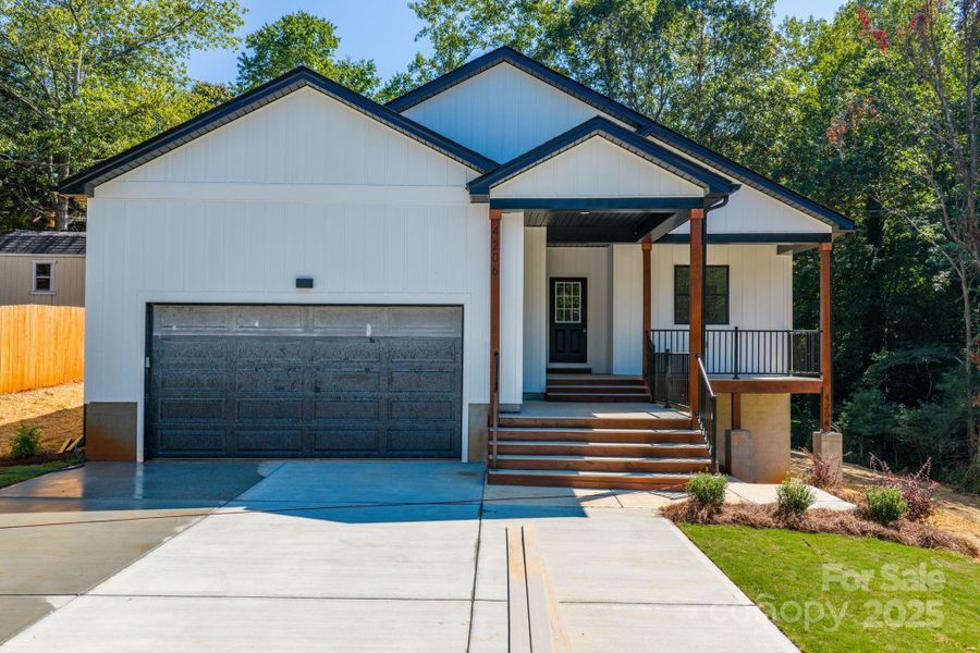 Front exterior of a new home in , Hickory, NC, highlighting curb appeal (Image 1). Front exterior of a new home in , Hickory, NC, highlighting curb appeal (Image 1).