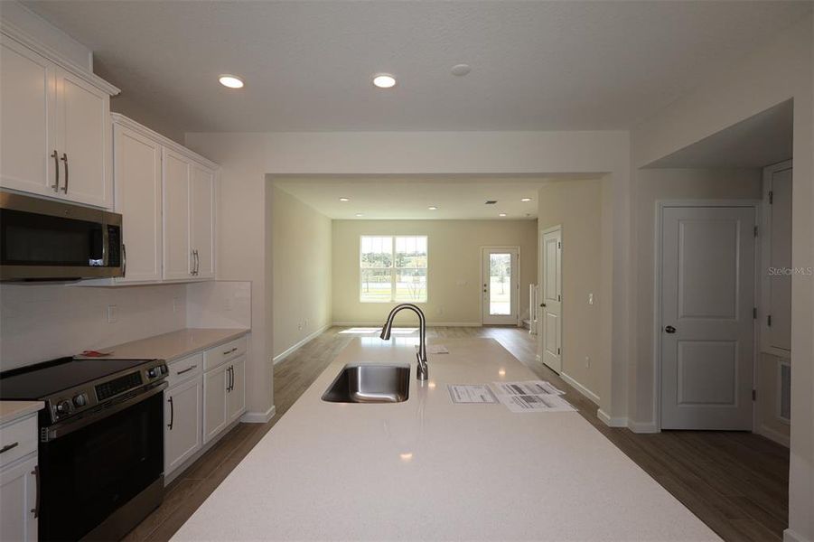 Furnished interior view inside a new home in Center Lake on the Park, St. Cloud (Image 8).