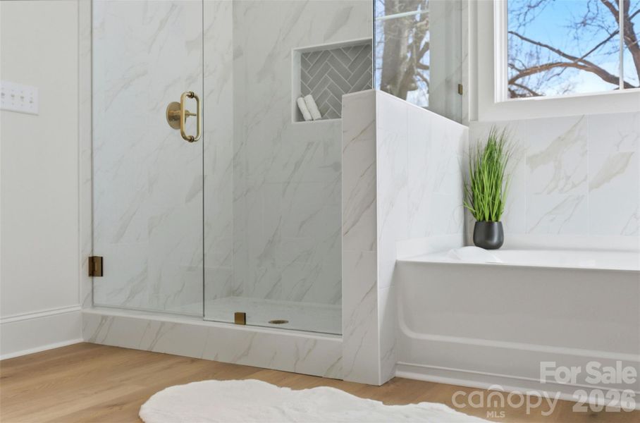 ensuite bathroom- tiled bath, frameless shower, shiplap dual vanities