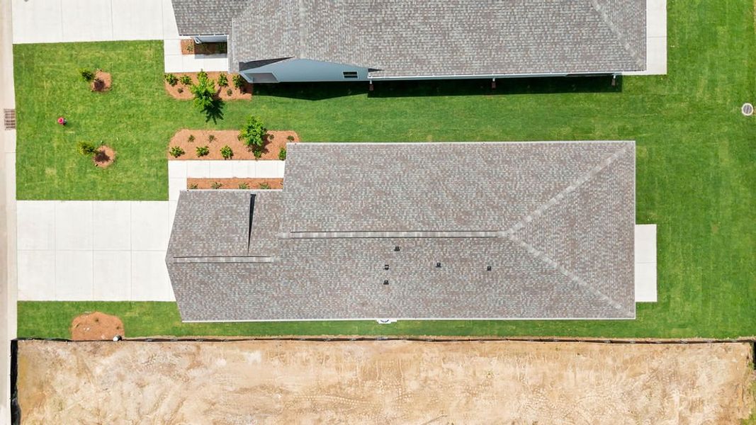 Exterior details and patio area of a home in Sun City Hilton Head, Bluffton (Image 26).