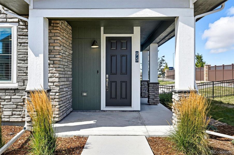 Entry with wrap-around porch