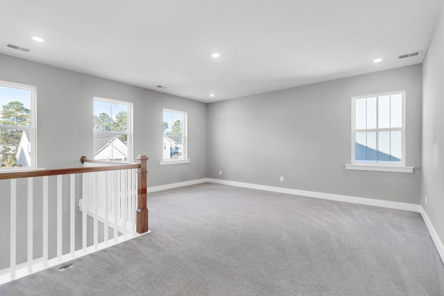 Spacious, unfurnished interior of a new home in Carnes Crossroads: Coastal Collection, Summerville (Image 31).