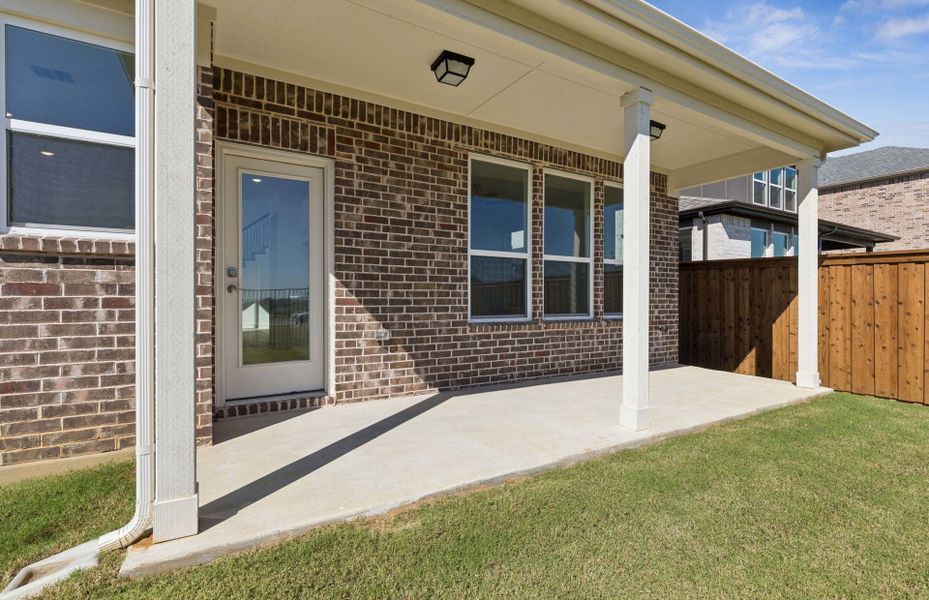 Exterior details and patio area of a home in Spiritas Ranch, Little Elm (Image 3). Exterior details and patio area of a home in Spiritas Ranch, Little Elm (Image 3).