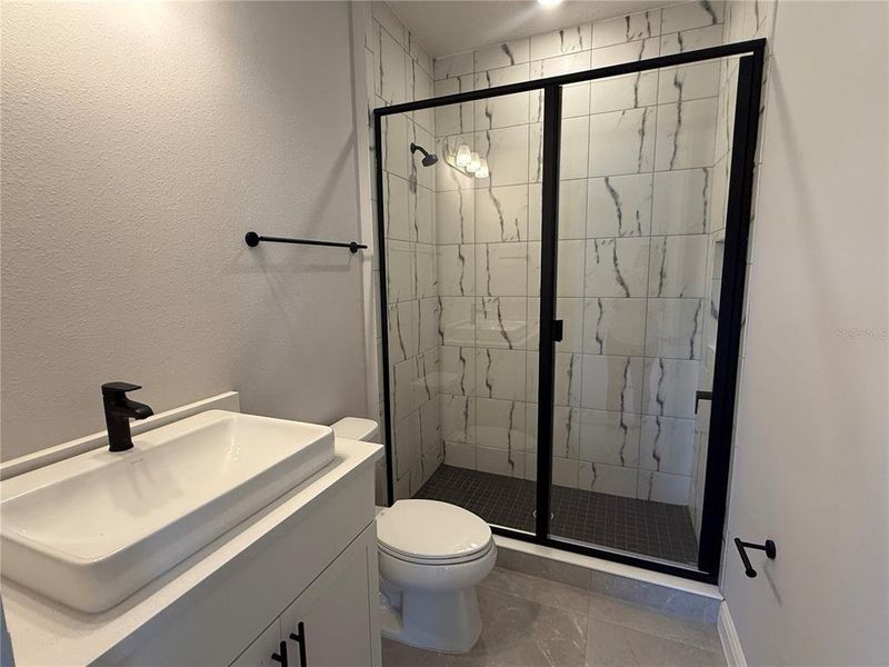 Furnished interior view inside a new home in Laureate Park, Orlando (Image 7).