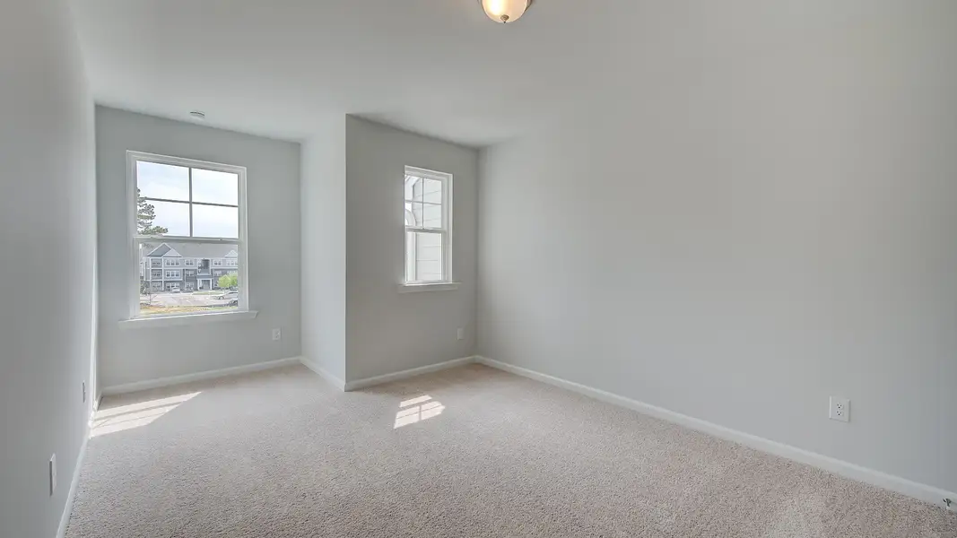 Spacious, unfurnished interior of a new home in Langley Overlook, Loganville (Image 24).