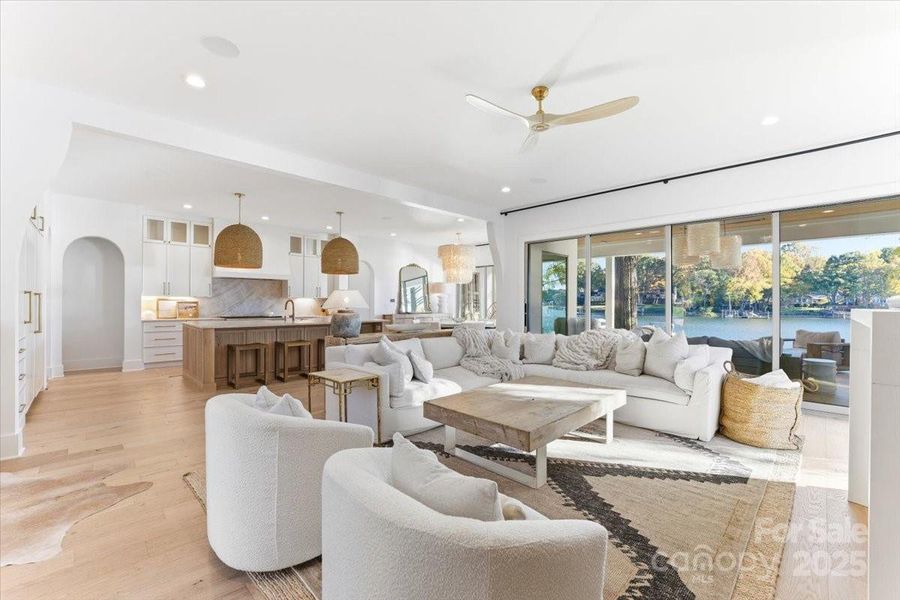 Stacked sliding glass doors in the Great Room open to the covered patio and make for great entertaining, both inside and out. Stacked sliding glass doors in the Great Room open to the covered patio and make for great entertaining, both inside and out.