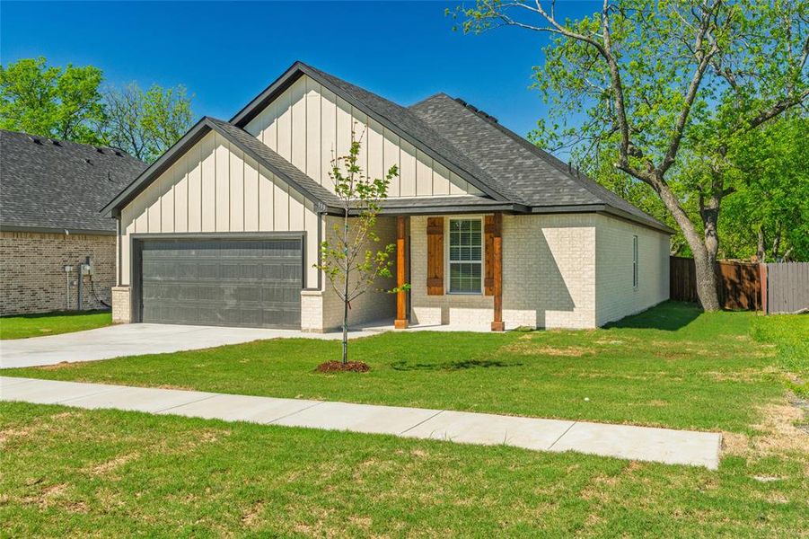 Front exterior of a new home in , Celeste, TX, highlighting curb appeal (Image 25).