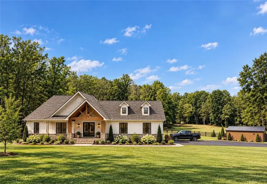 Front exterior of a new home in , Mableton, GA, highlighting curb appeal (Image 4).