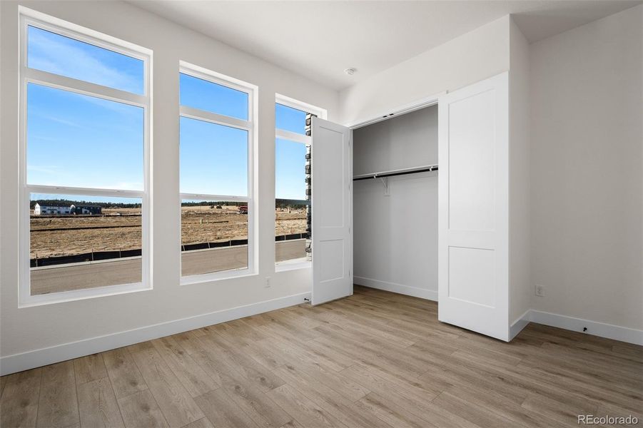 Spacious, unfurnished interior of a new home in Wolf Ranch - Enclave Collection, Colorado Springs (Image 29).