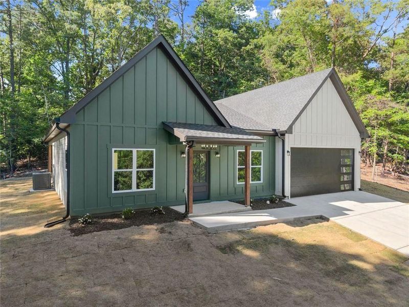 Front exterior of a new home in , Gainesville, GA, highlighting curb appeal (Image 24).